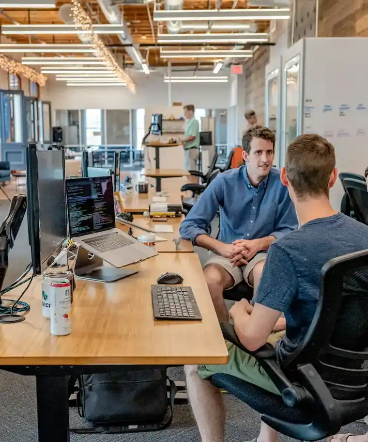 TalentBridge consultants interviewing a candidate in a bright Kyiv office